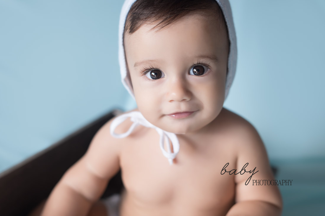 Bebé Adri sonrisa pícara