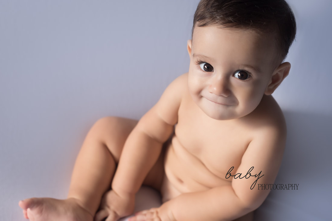 Sesión de fotos bebé Adri sentado